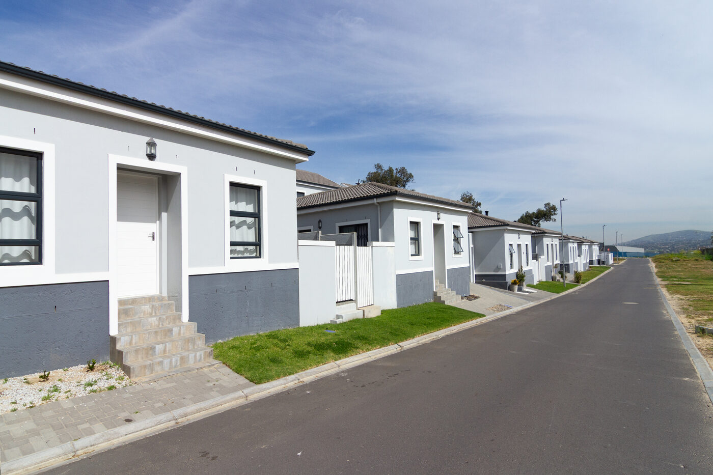 Completed single-storey Bracken Reserve homes along a street